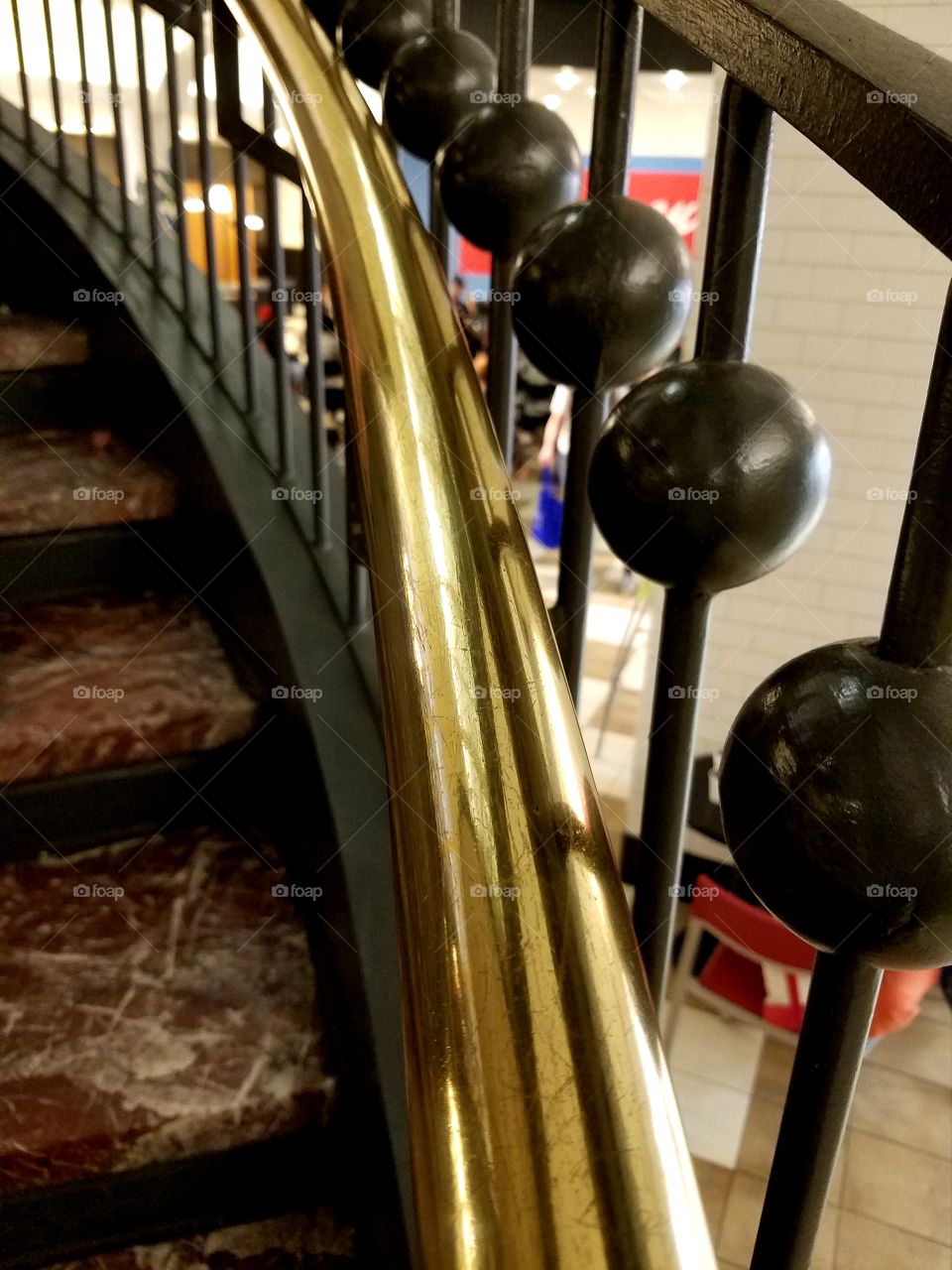 Gold stair rail