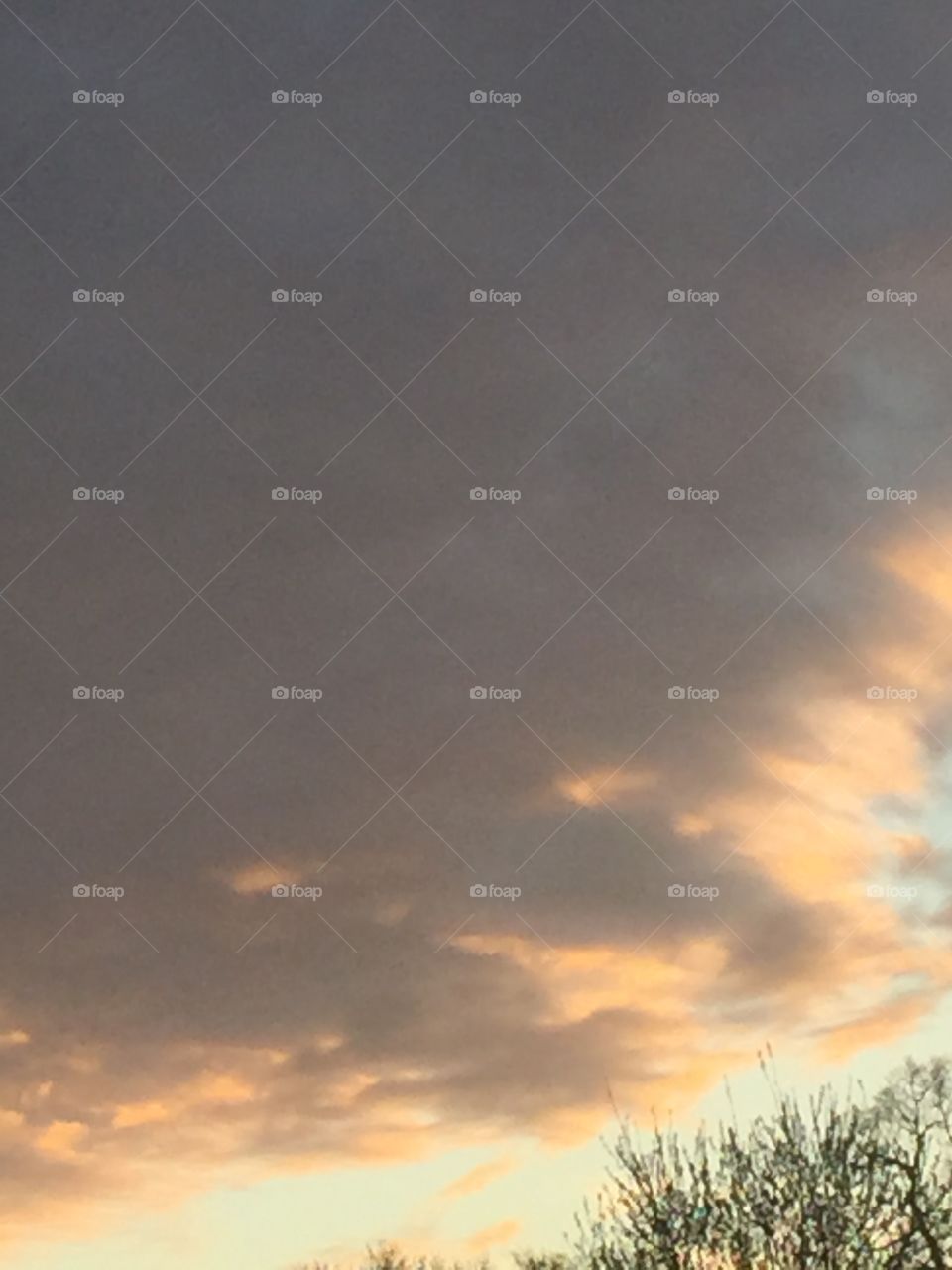 Storm clouds orange and grey