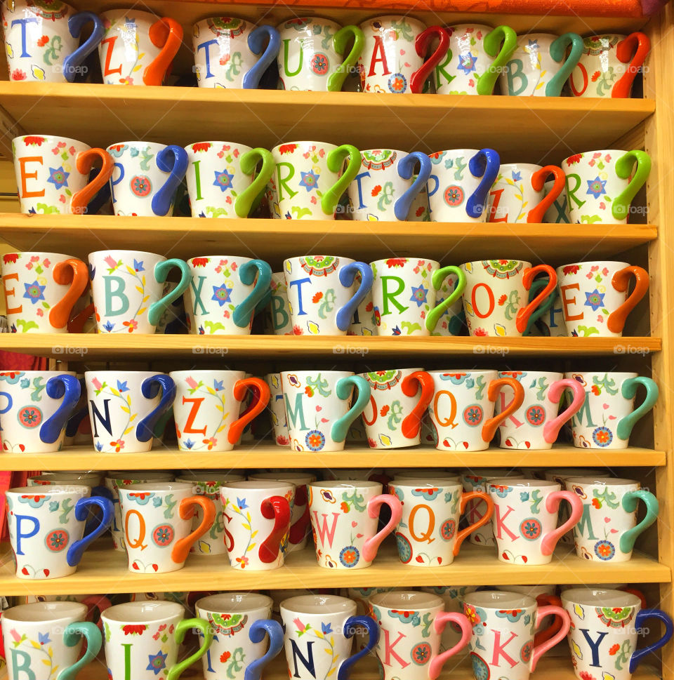 Shelf full of alphabetical coffee cups!