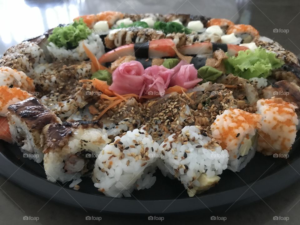 A plate of colorful sushi