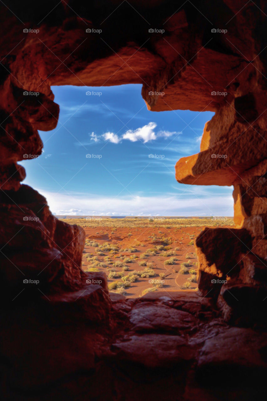 Arizona desert through a pueblo window