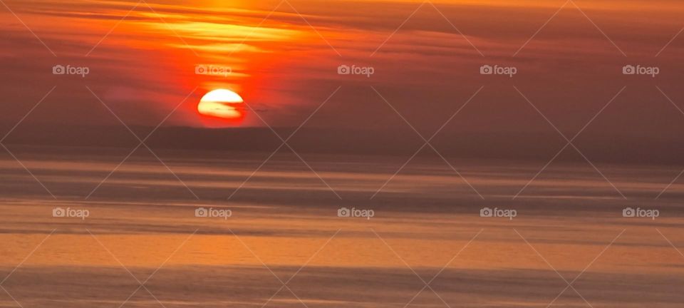 PORTLAND SUN SETTING IN THE DISTANCE UK