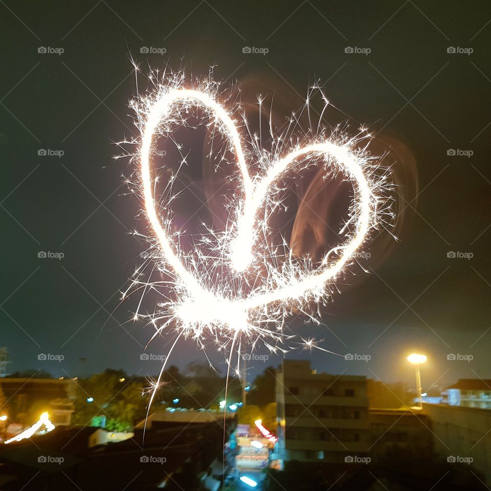 Heart shape burning sparkler