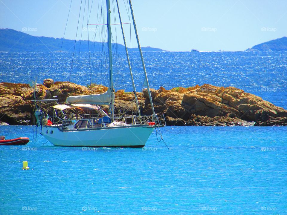 Boat in the blue sea