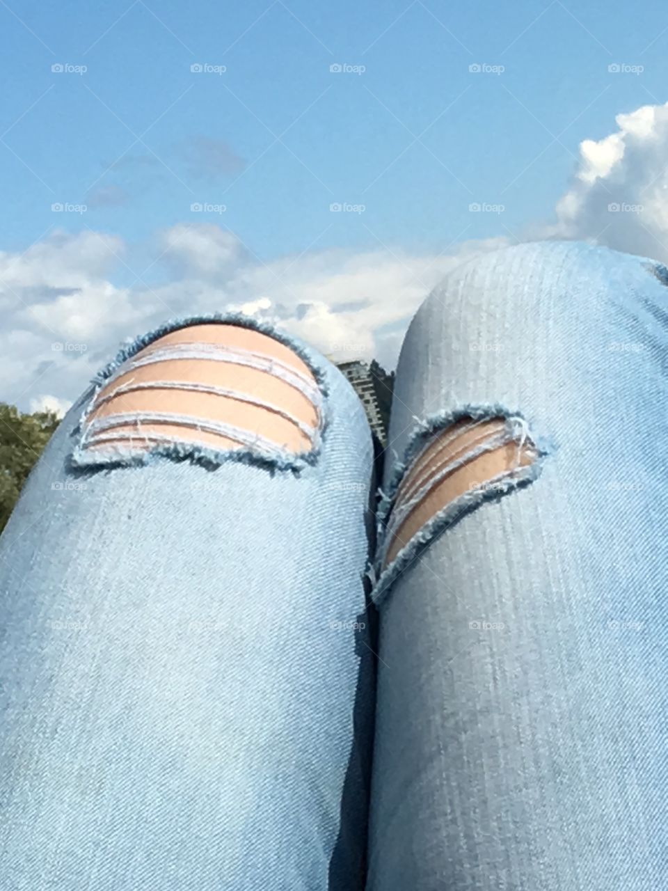 Torn dearly loved denim jeans