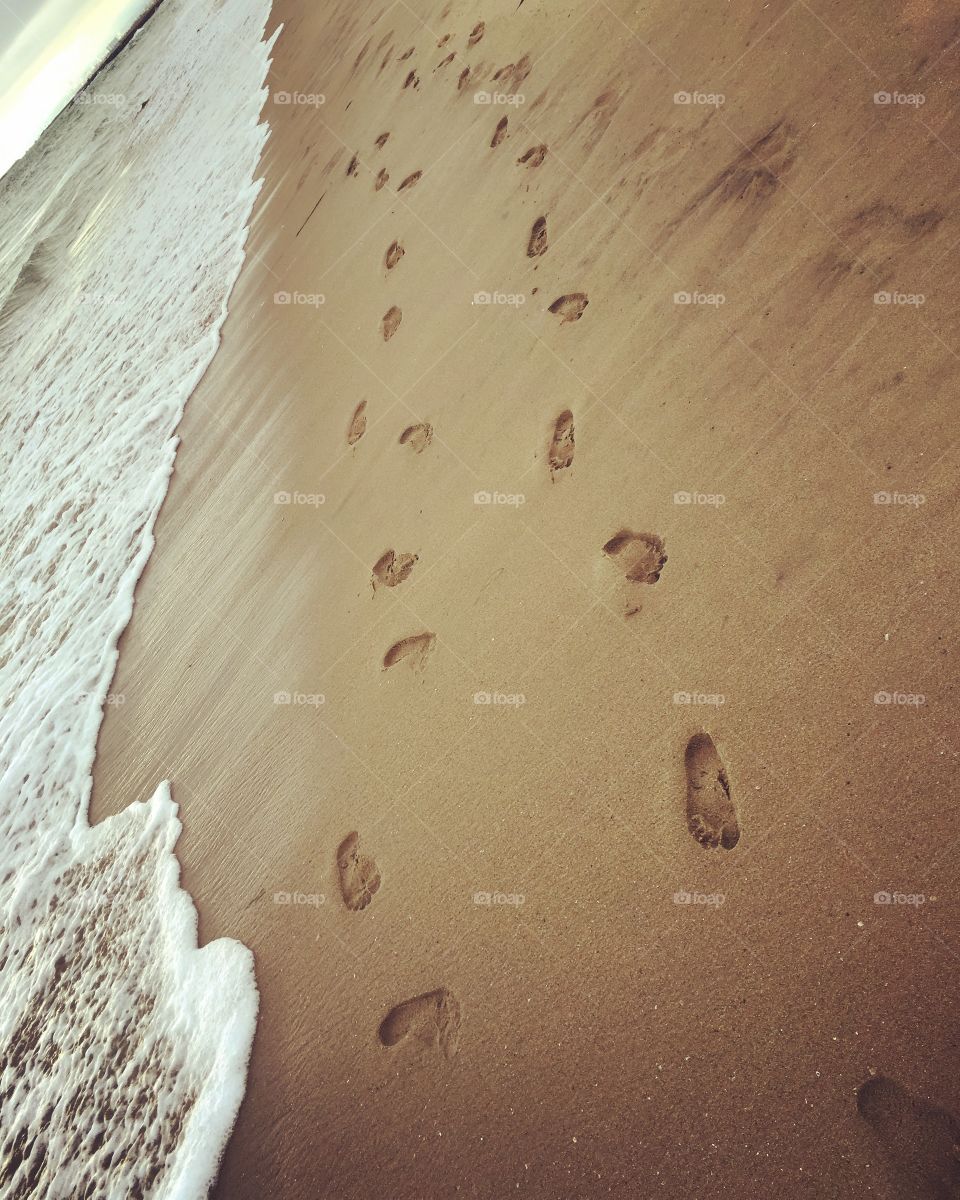 Footprints on the beach 