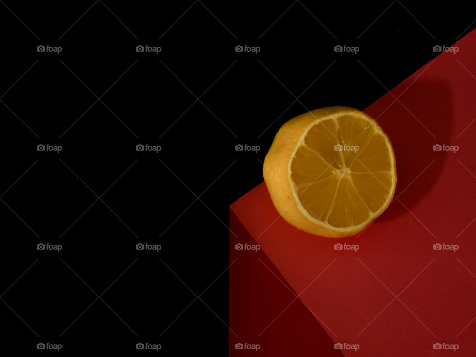 Slice of fruit on a black background