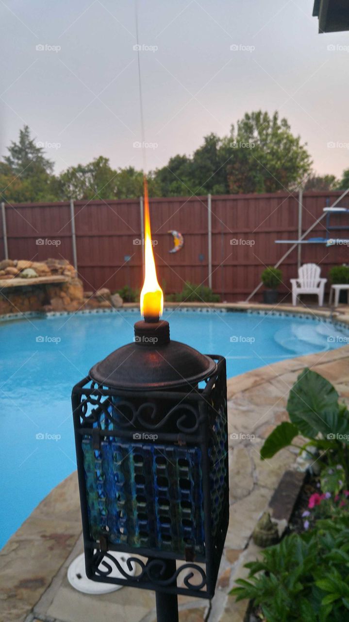 a flame amidst the pool