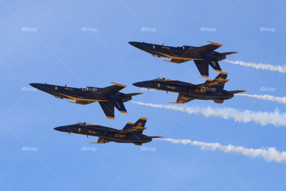The incredible US Navy Blue Angels demonstration team fly the F/A 18 Hornet in very close formation with amazing precision