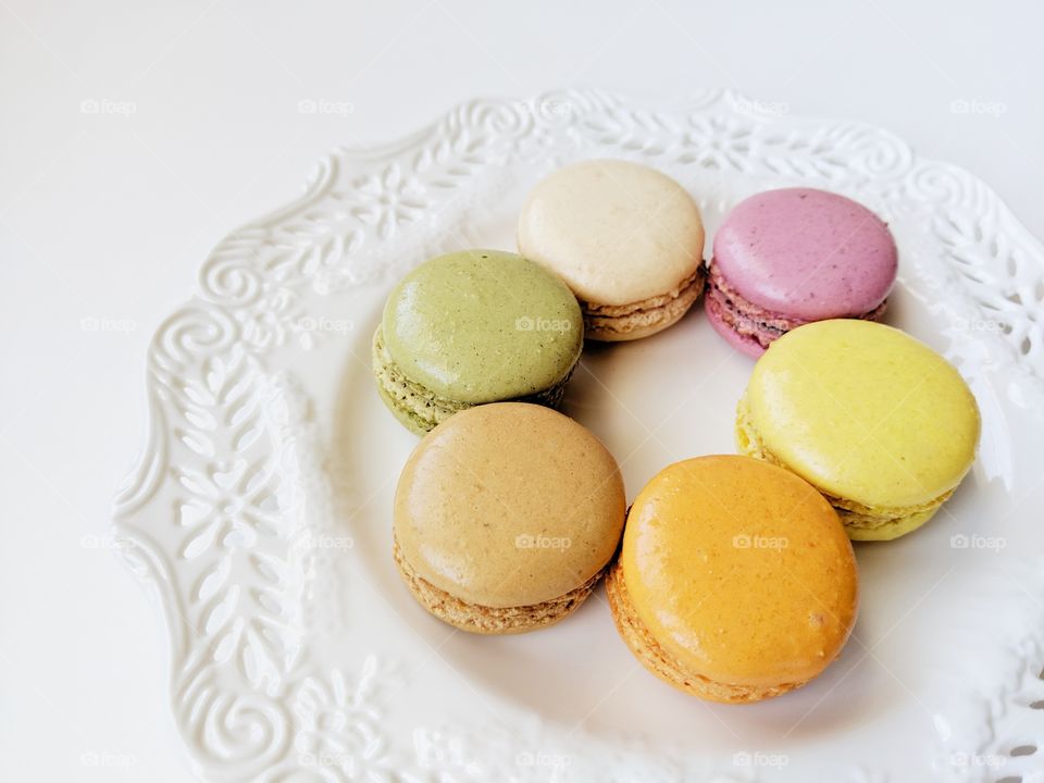 Delicious, tasty and a rainbow of French macarons made of apricot, coconut, fig, lemon, pistachio and salted caramel.