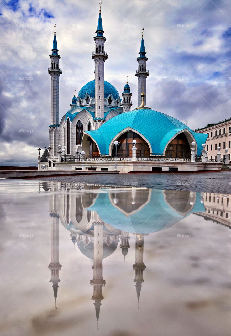 Mosque with reflection after rain