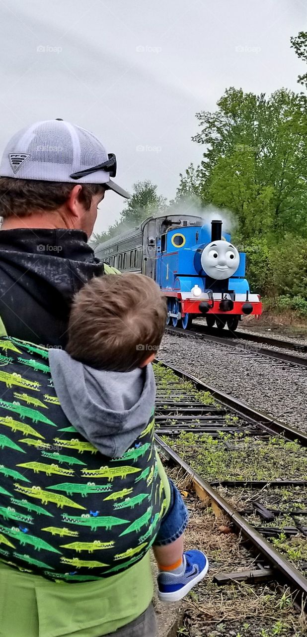 father and son with Thomas the tank engine
