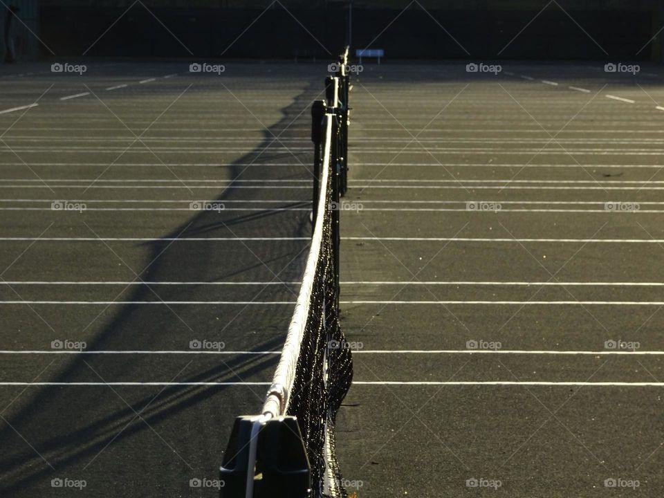 Tennis court in late afternoon 