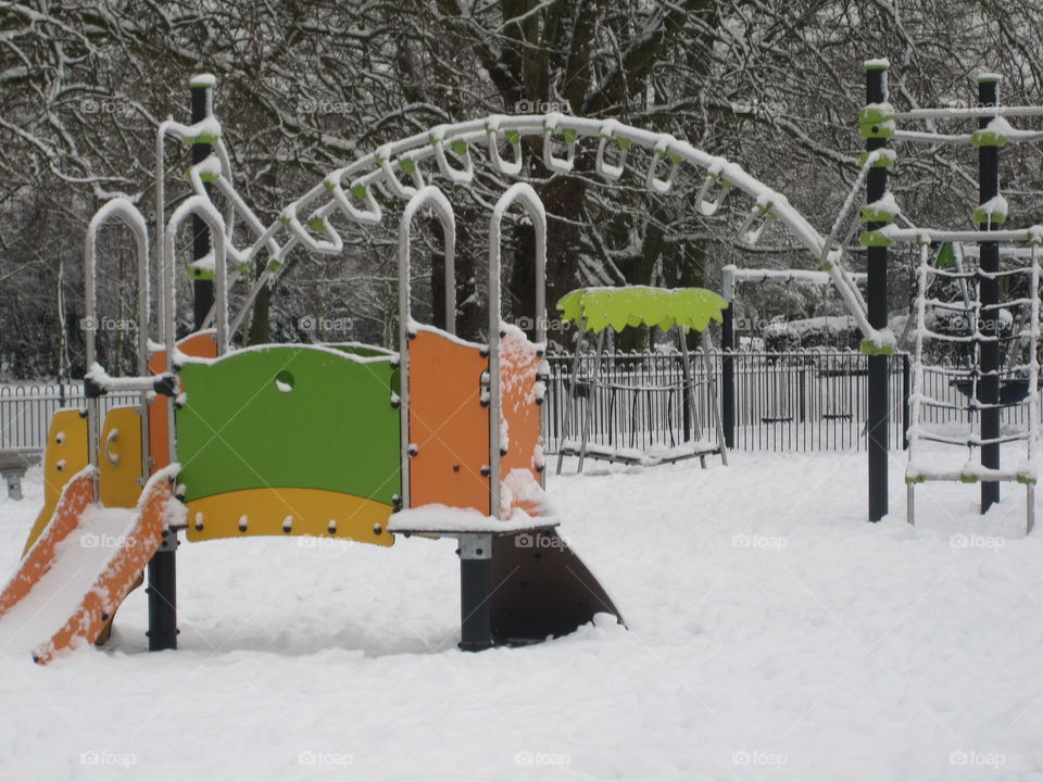 play equipment in the snow