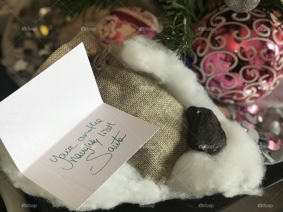 Lump of coal with note from Santa
