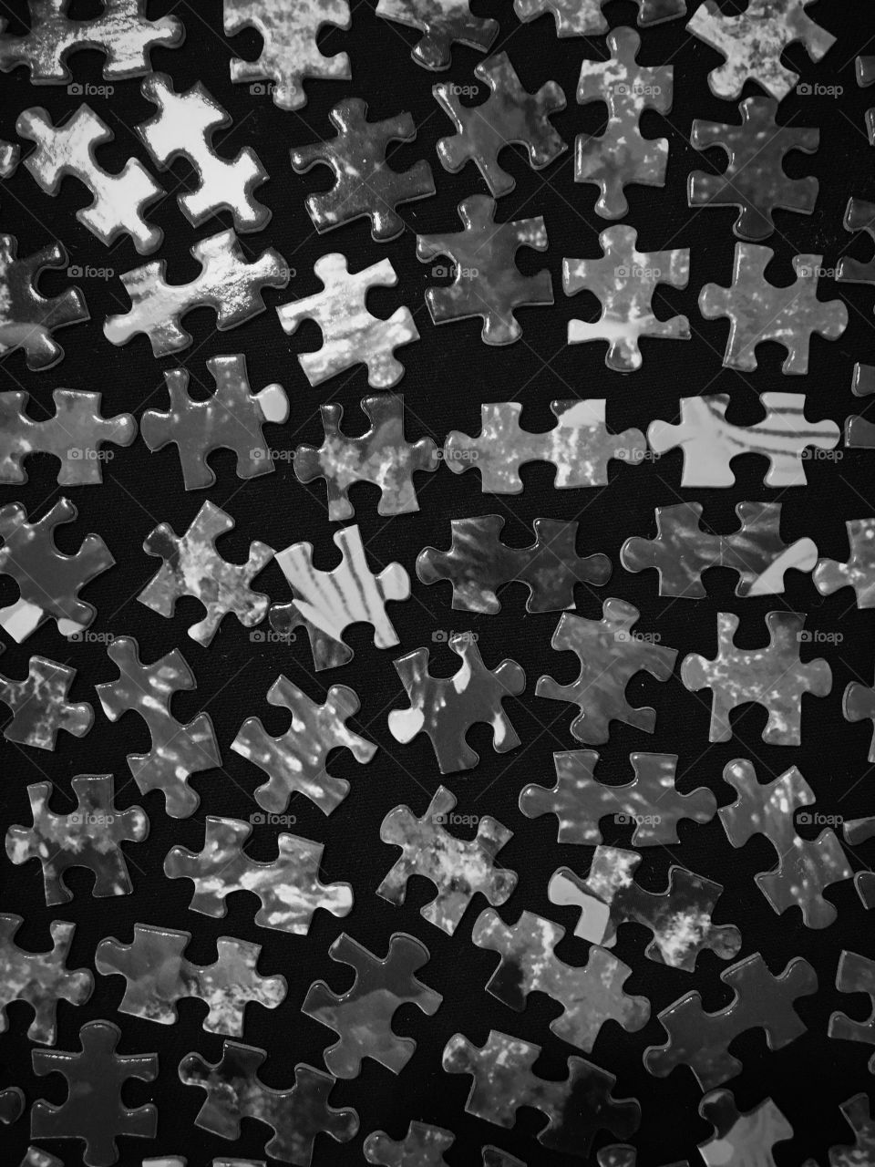 Puzzle pieces in black and white 