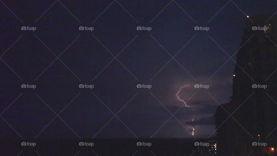 Thunderstorm at the Beach. Nighttime thunderstorm in Orange Beach Alabama.