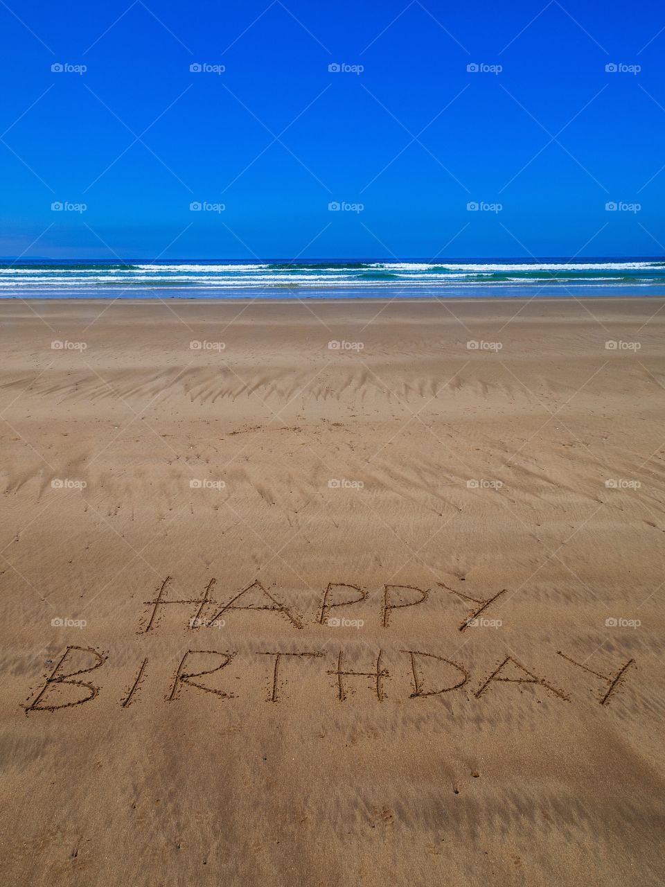 Happy birthday beach writing 