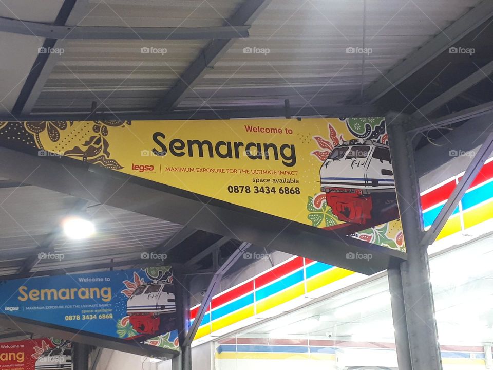 display board in the corridor next to the train departure gate