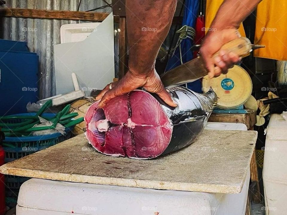 Cutting fish for cooking
