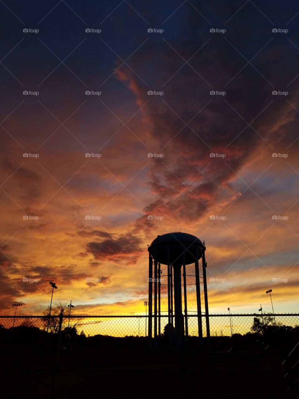 Water tower during sunset