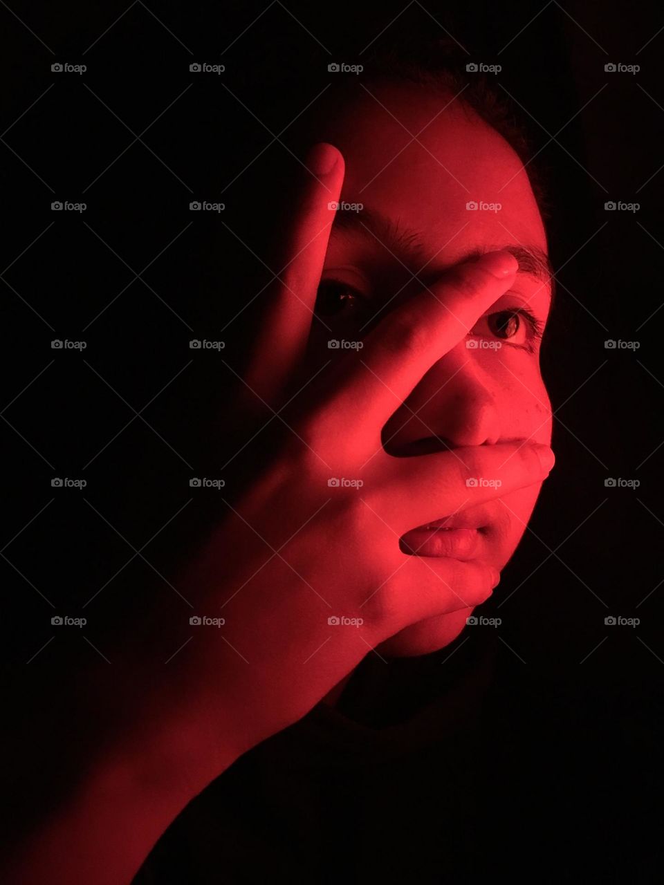 Red face. Hand 