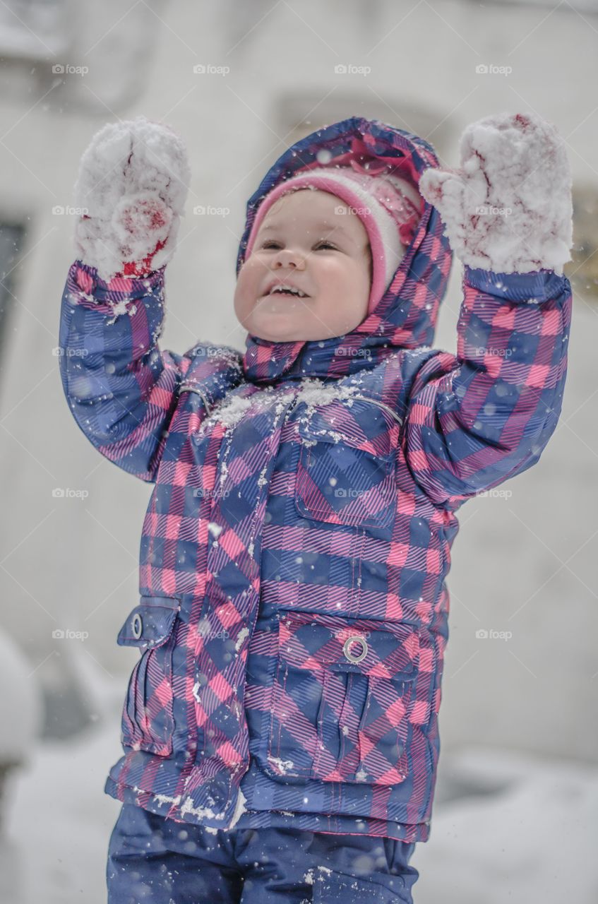 Toddler with frozen gloves