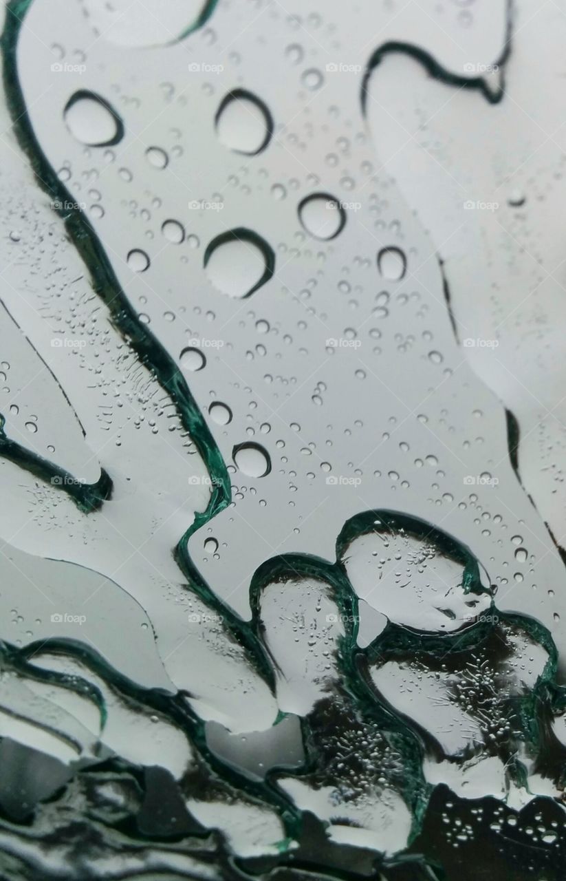 ice streaks on a vehicle windshield