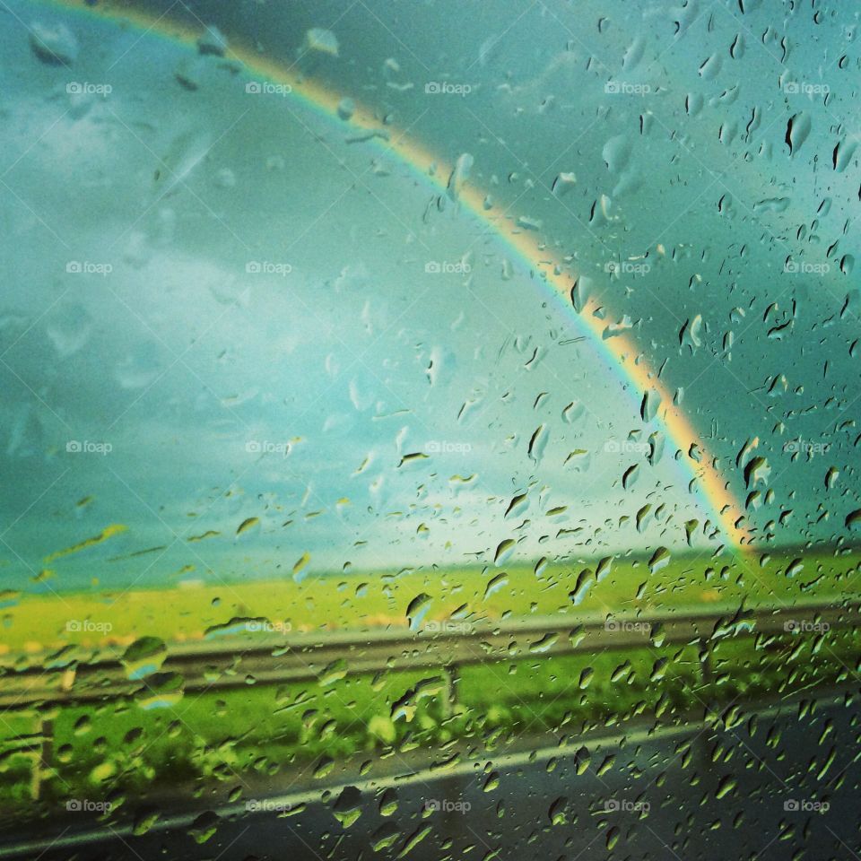Summer rain. Rainbow