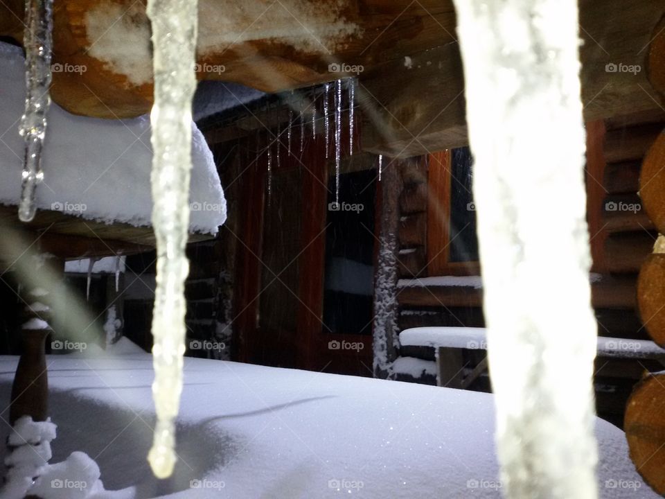 icicle on wooden house