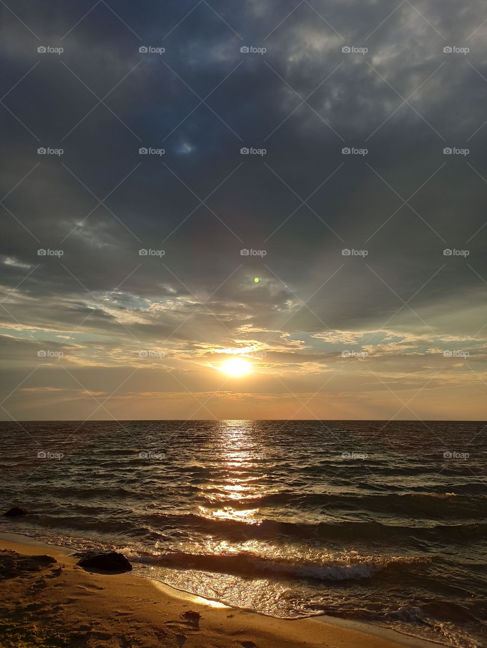 Sunrise. Dawn. The birth of the day. The sun. Shine. Sea. Rays. Sunbeam. Sun rays.