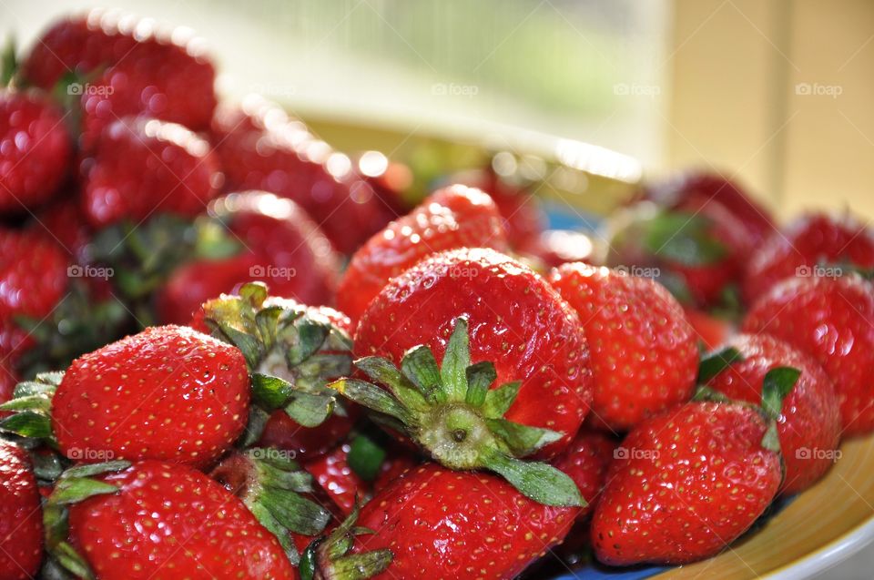 ripe strawberries on the plate