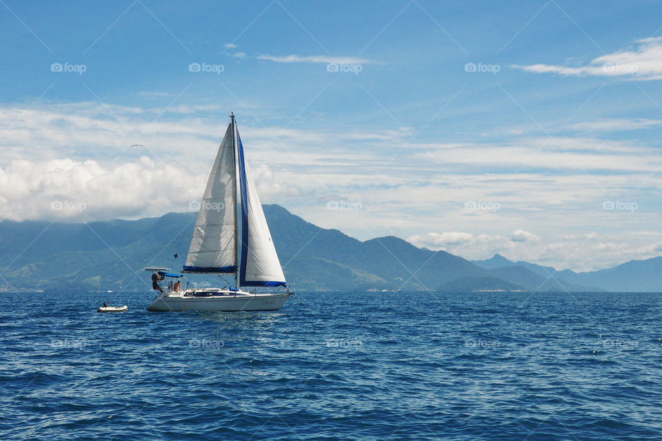 Boat in the blue immensity