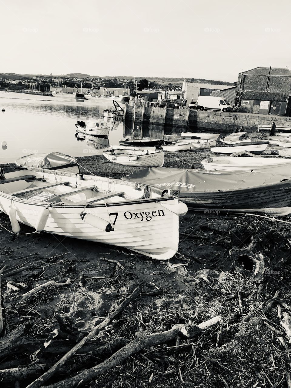 The identical Teignmouth harbor scene in monochrome, can you decide which photo is preferred.