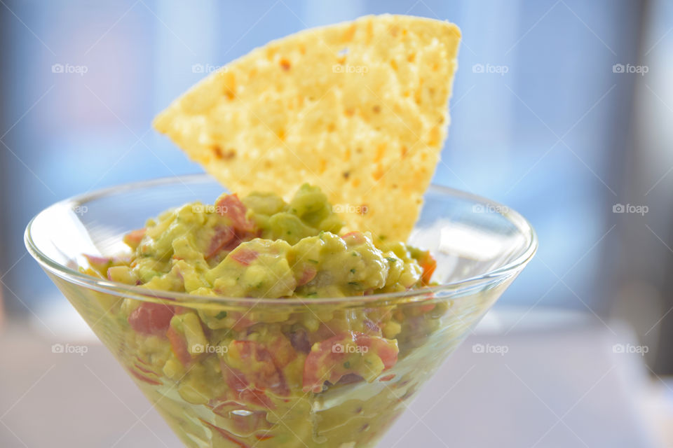 Guacamole served in a martini glass