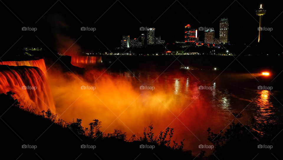 Evening light display at Niagara Falls (American side).