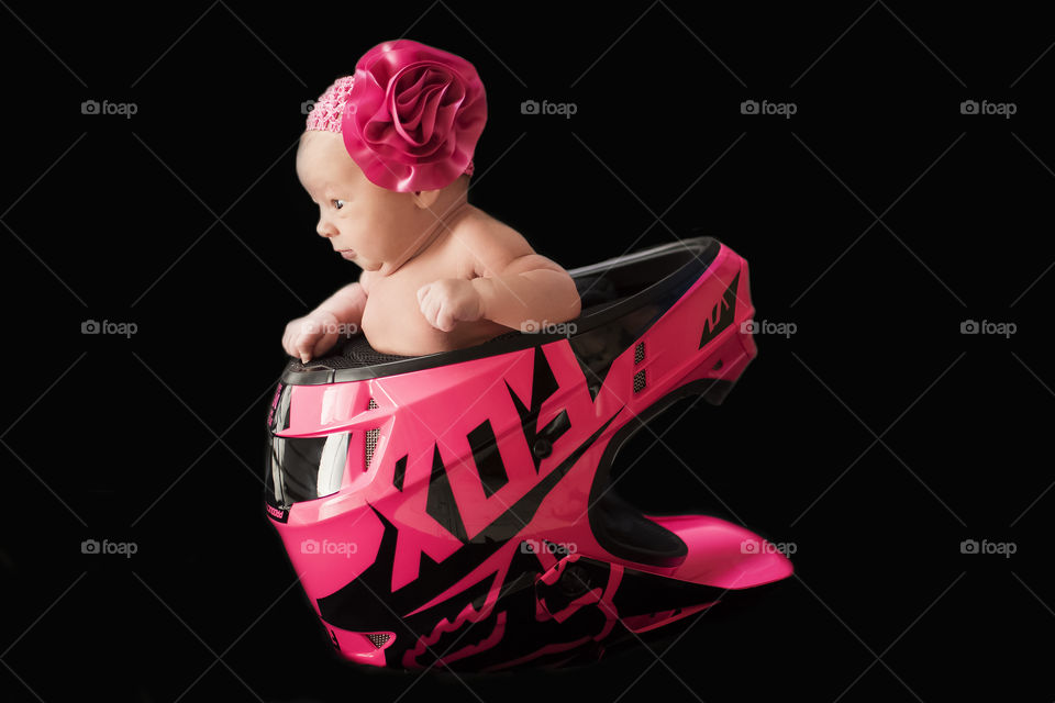 Cute baby against black background