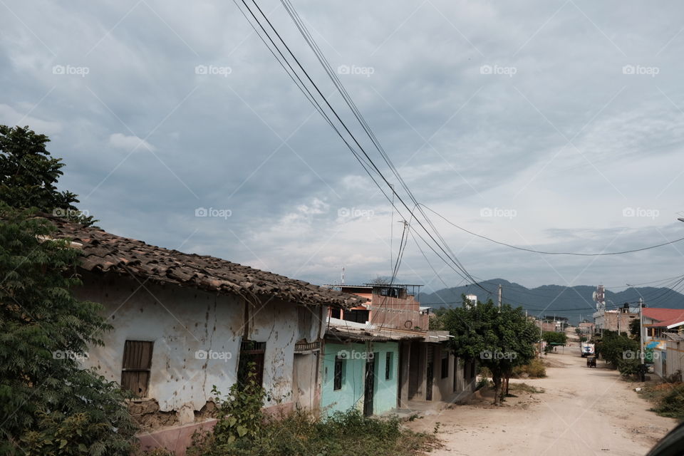 Neighborhood street with original houses in coastal town