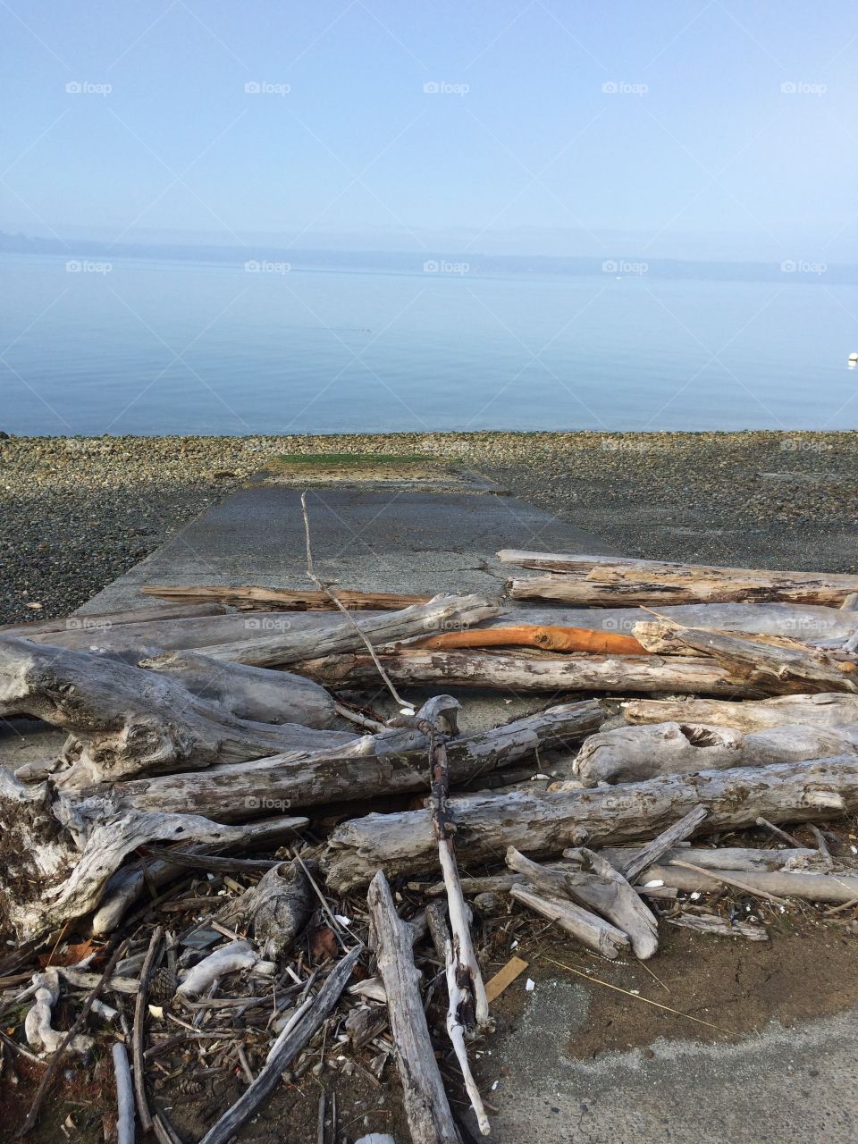 Very much a Seattle way to tell you, you’re not invited. Driftwood on the boat launch.
