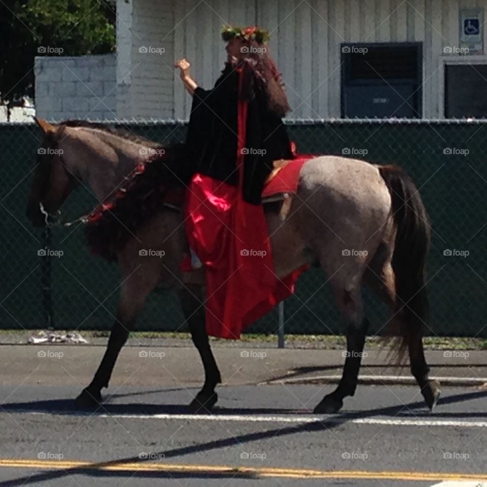 Hawaiian cowgirl rides