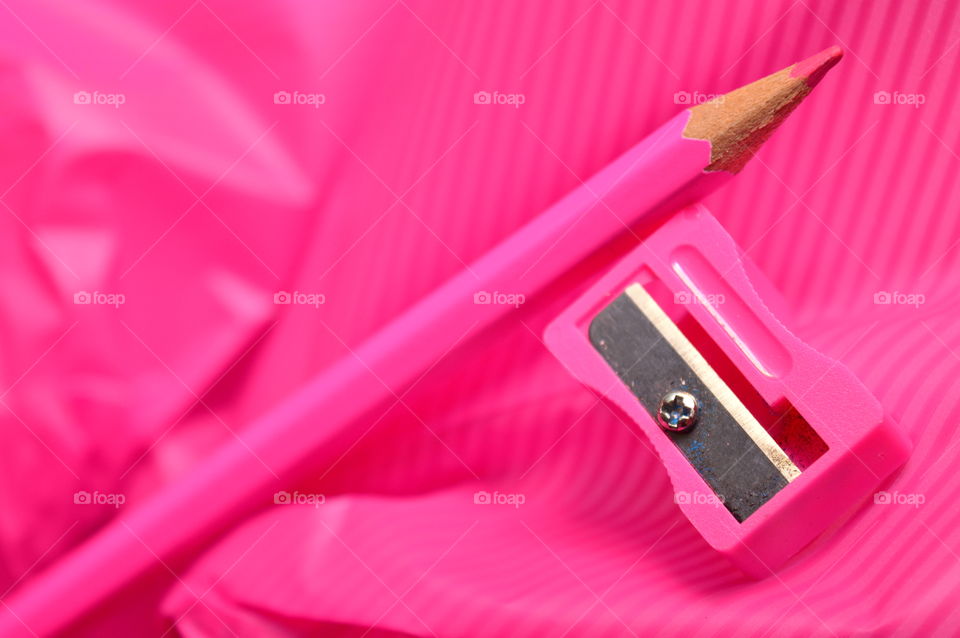 PINK PENCIL SHARPENER AND PINK PENCIL