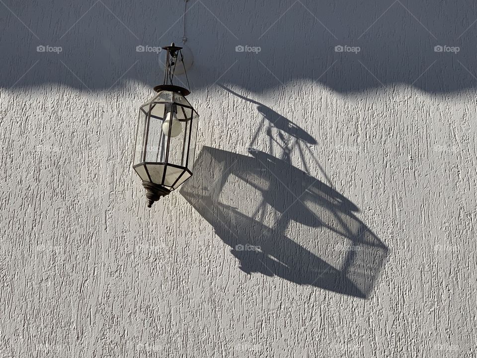 Lamp and it’s shadow this photo was taken somewhere in Colombia on my holiday last year. 