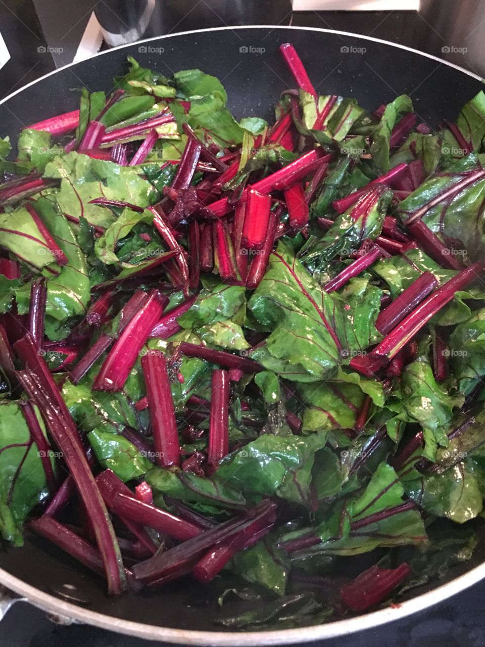 Closeup, beet root greens leaves background food image healthy eating