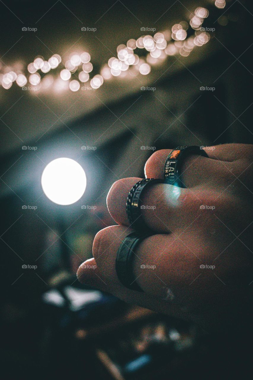 All my dark rings on hand featuring lens flare.
