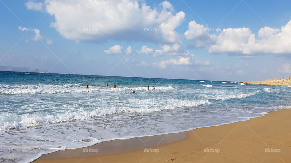 Spaß beim Baden im Meer, auf Kreta