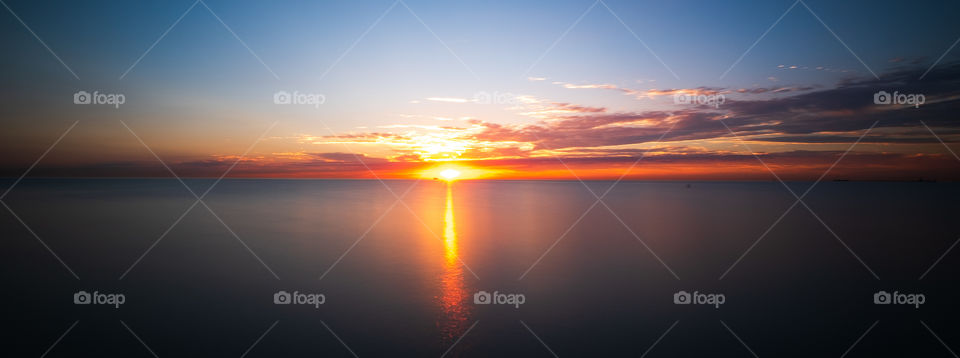 Colorful sunrise rising over Lake Michigan 
