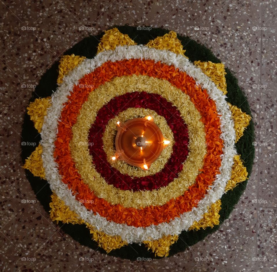 RANGOLI WITH FLOWERS