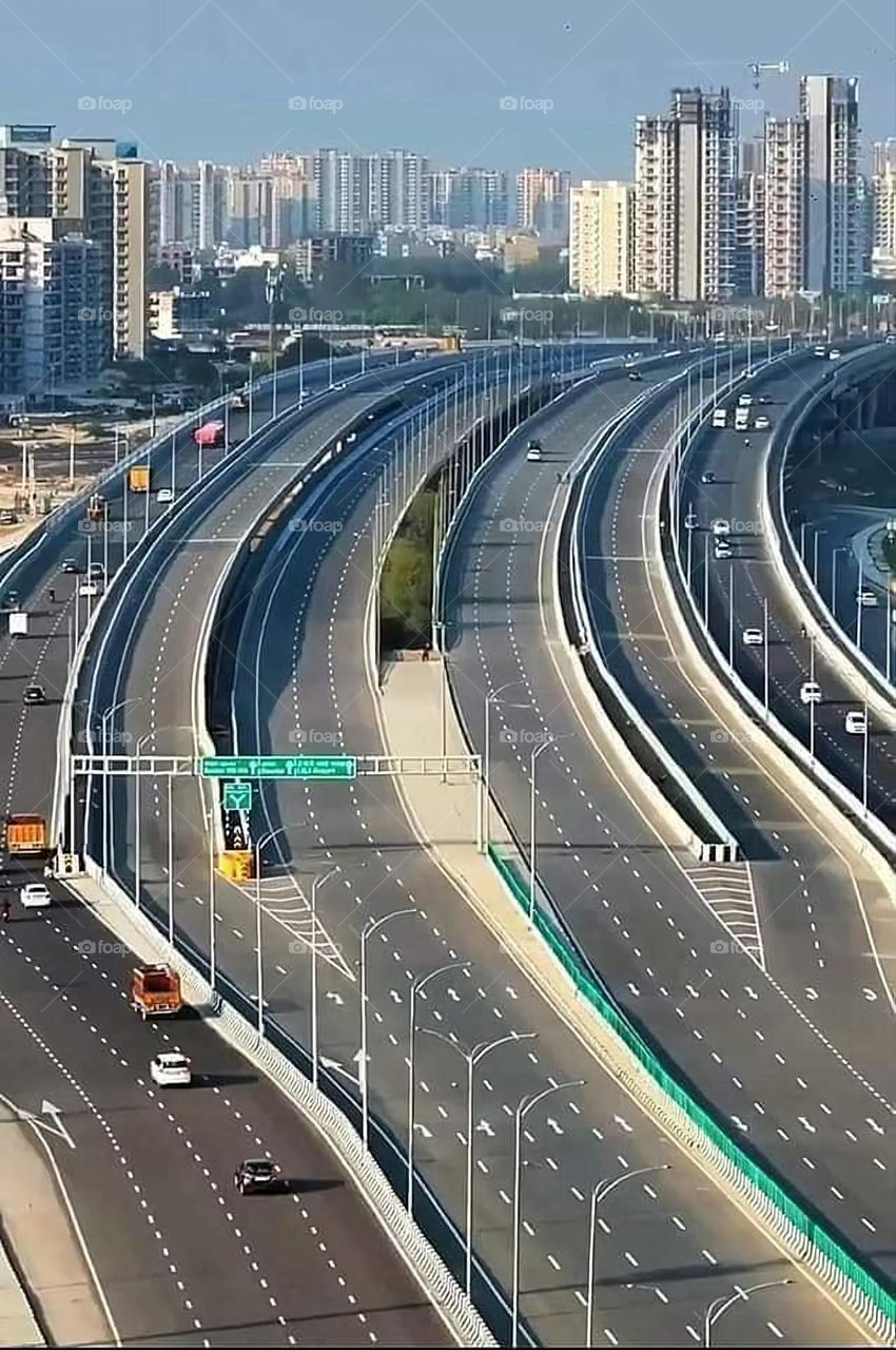 Glory be to God, and the wonderful picture. The picture of the road is beautiful with the very tall buildings. It is a wonderful picture and there is nothing more wonderful than it.