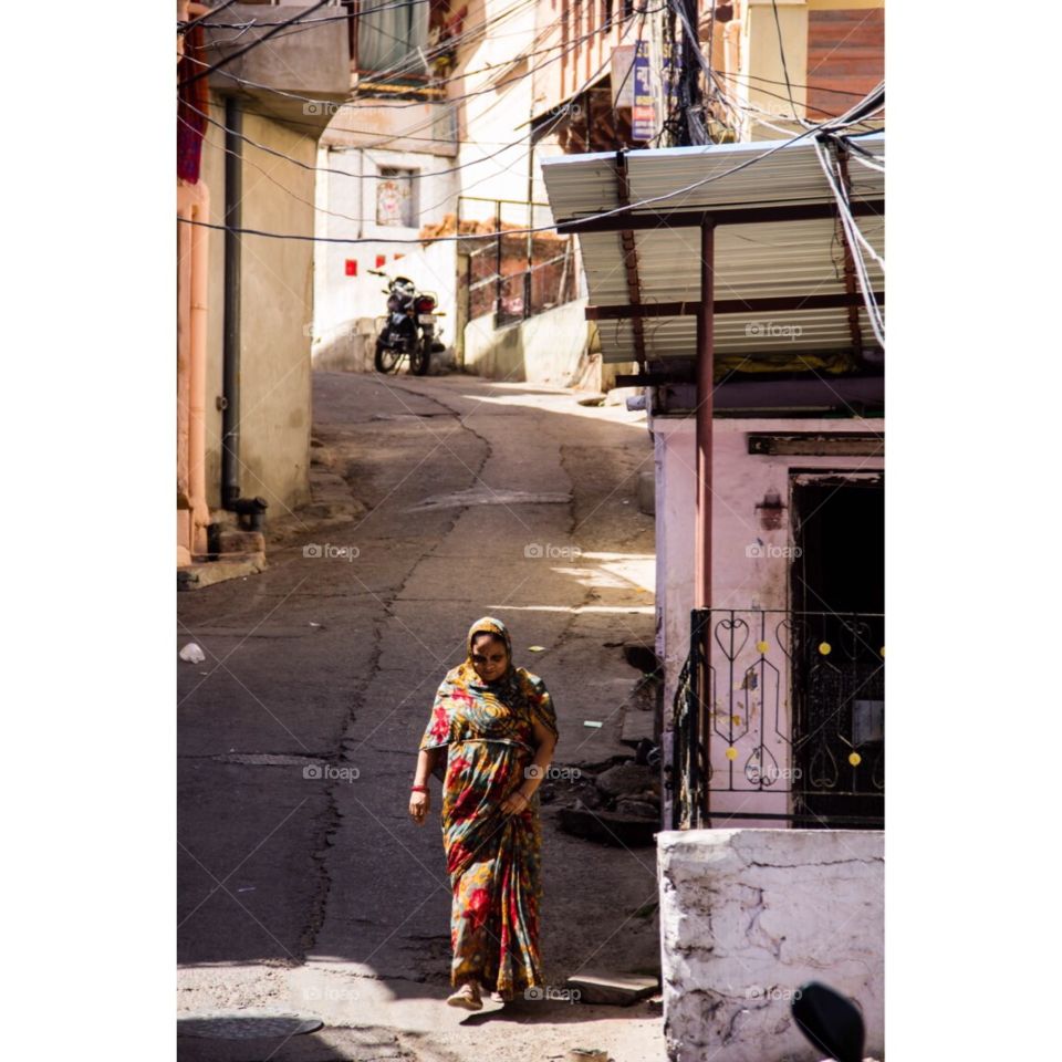 Woman walk in India street