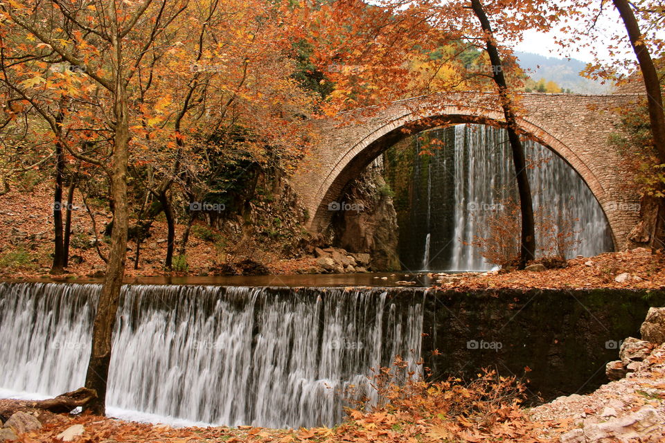 Waterfall bridge during fall